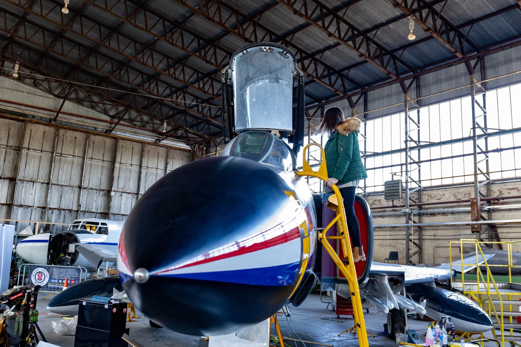 Historic jet aircraft inside the Ulster Aviation Society hangar
