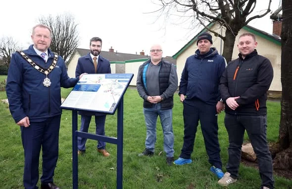 Mayor and community representatives at the Mallusk heritage trail board